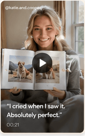 Pet parent holding a PawPrints photobook